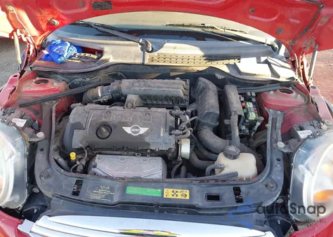 2010 Mini Cooper z USA, uszkodzony, nr VIN WMWMF3C52ATU79415